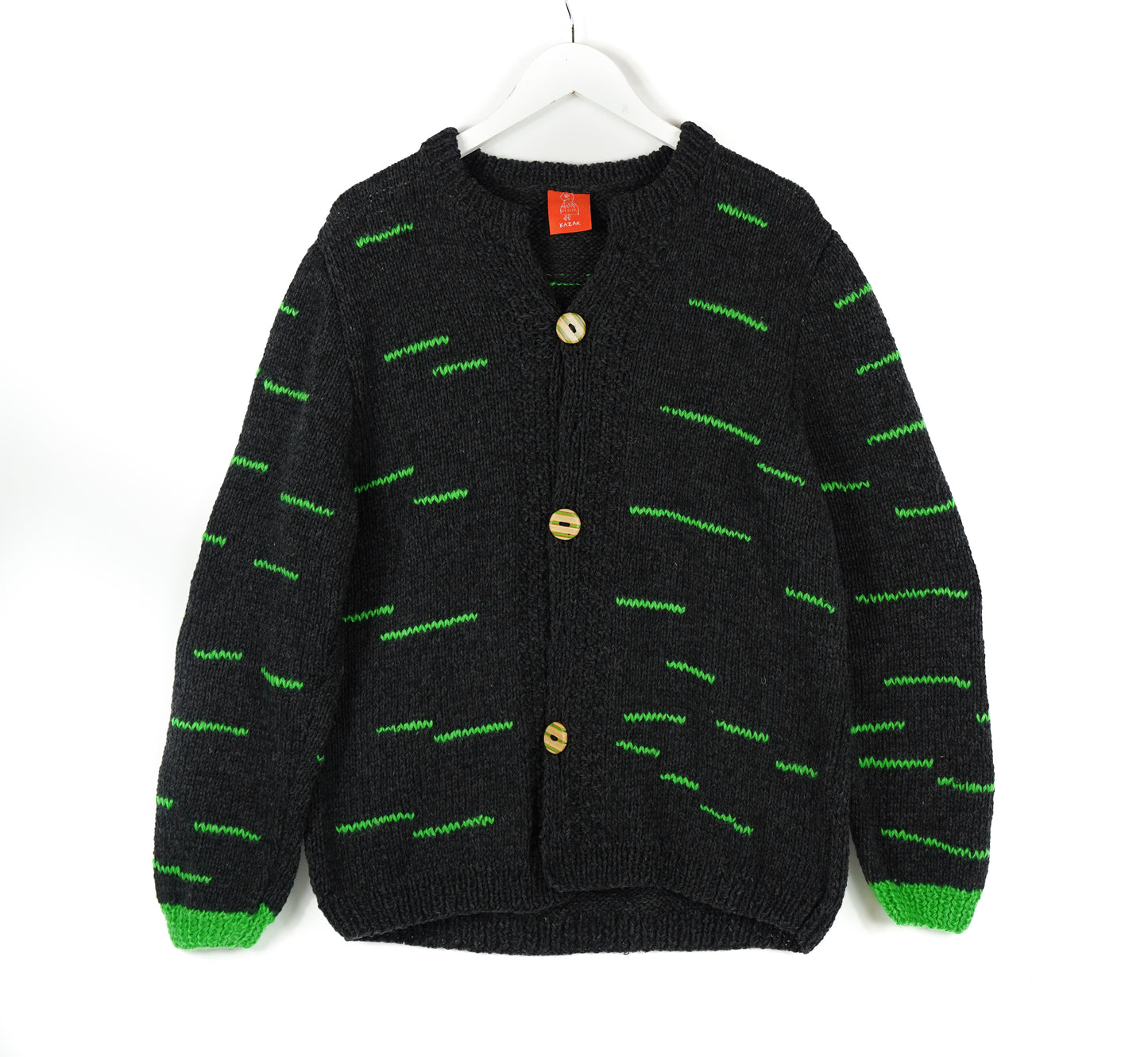 Pure Wool Cardigan with black on green stripes. Also has skatedeck upcuycled buttons on it. This is a one off, hand knitted cardigan