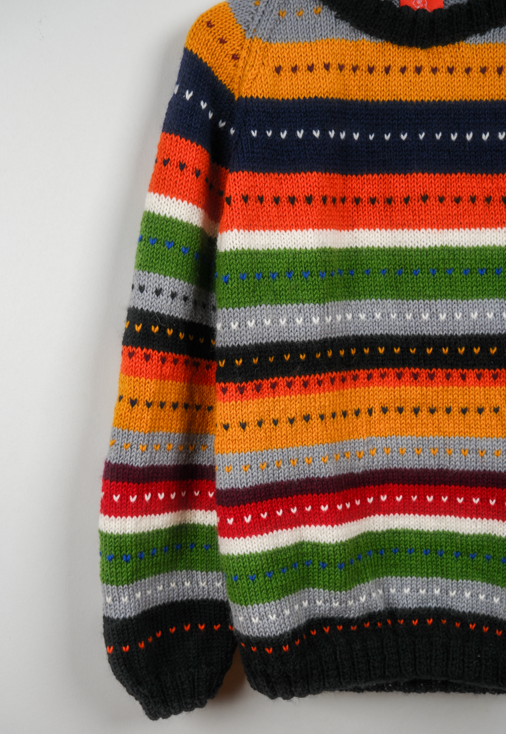 Pure Wool multiple colour jumper, hand knitted and pure wool from an East London brand.